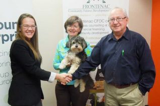 L-r Lisa Boyer, Futurpreneur business development officer, with the Frontenac CFDC's Anne Prichard (with Hughie) and Terry Romain launched their new partnership at the Frontenac CFDC in Harrowsmith on November 28.